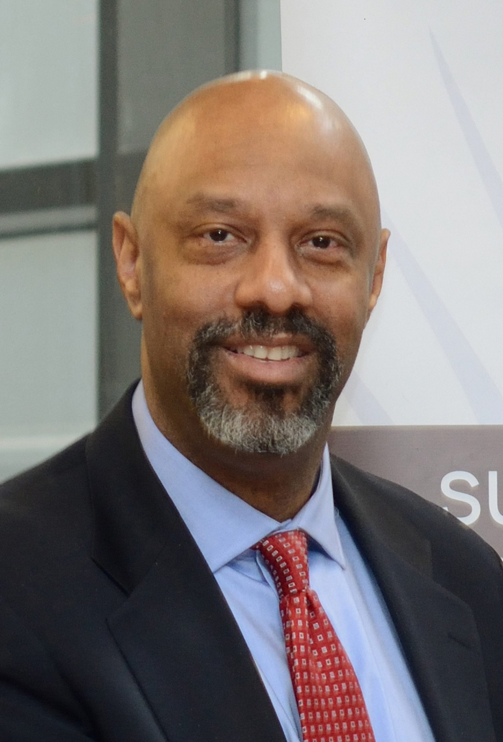 Headshot of Andrew Frazier- male wearing light blue shirt and red tie smiling Headshot of Andrew Frazier- male wearing light blue shirt and red tie smiling