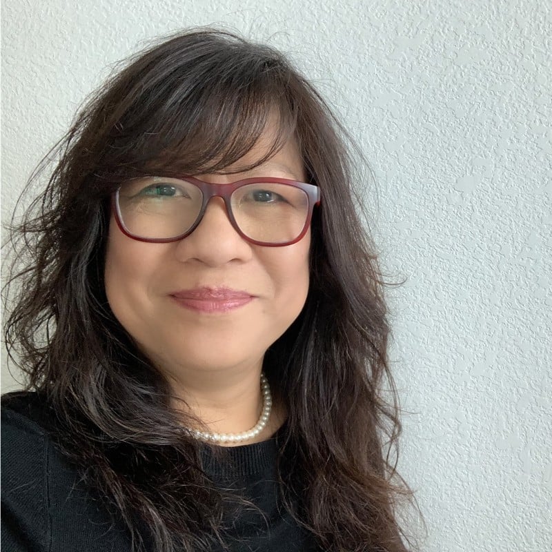 Headshot of Imelda Alejandrino - woman with brown hair wearing red glasses Headshot of Imelda Alejandrino - woman with brown hair wearing red glasses