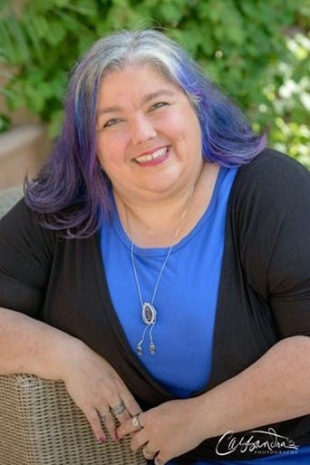 Headshot of Stacy Braiuca - woman with white and purple hair smiling Headshot of Stacy Braiuca - woman with white and purple hair smiling