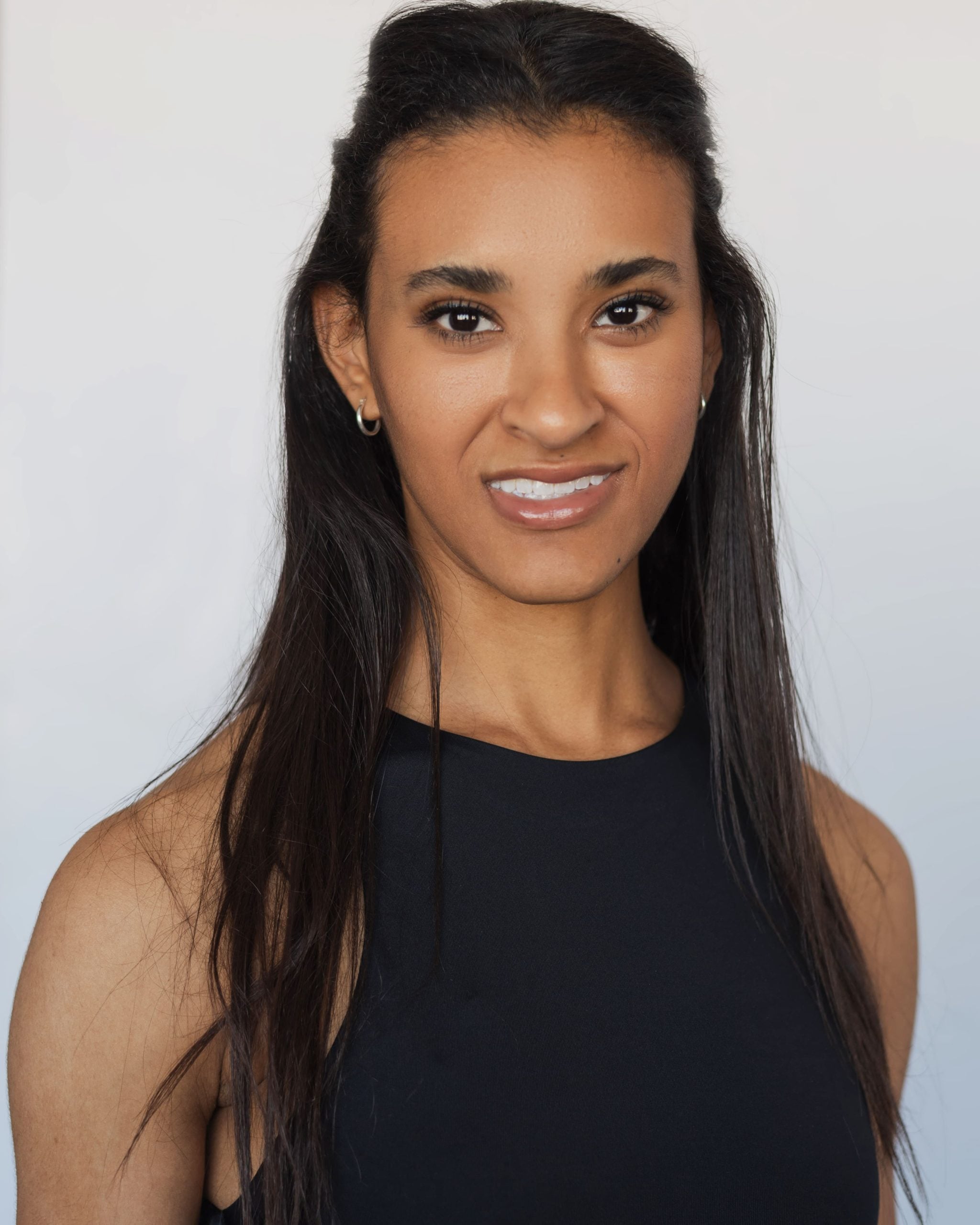 Headshot of Sydnee Stevenson wearing black top Headshot of Sydnee Stevenson wearing black top